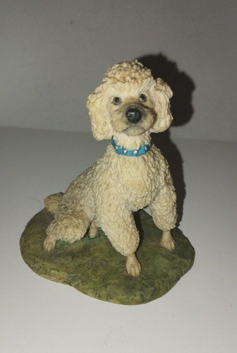 Seated white poodle figure - seated,